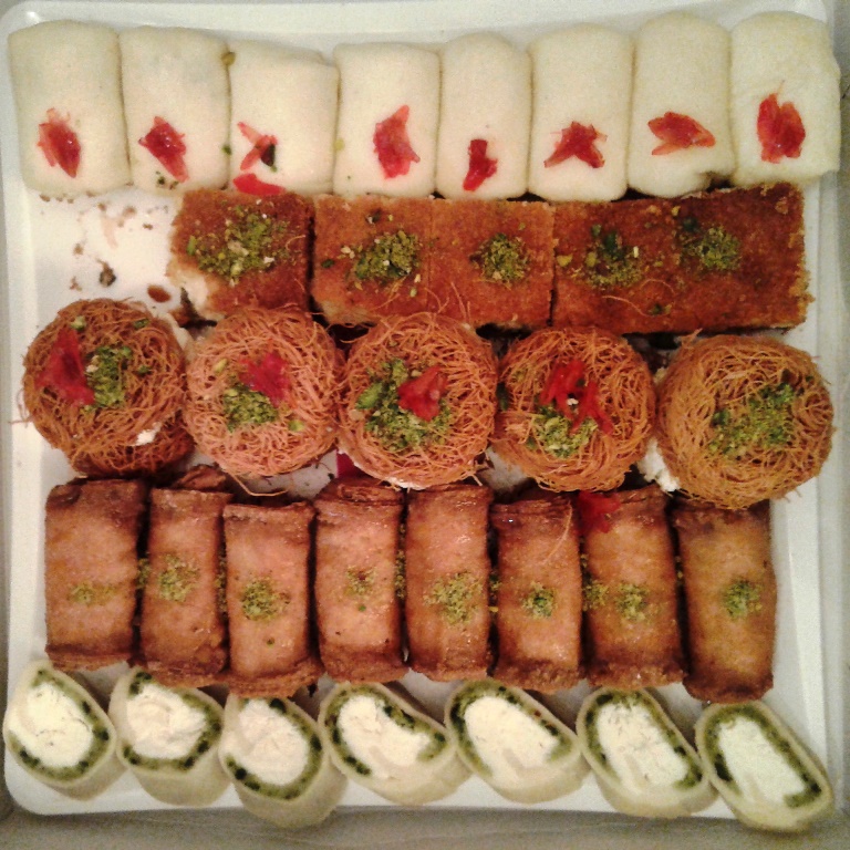 Arabic sweets drizzled with syrup and mazaher